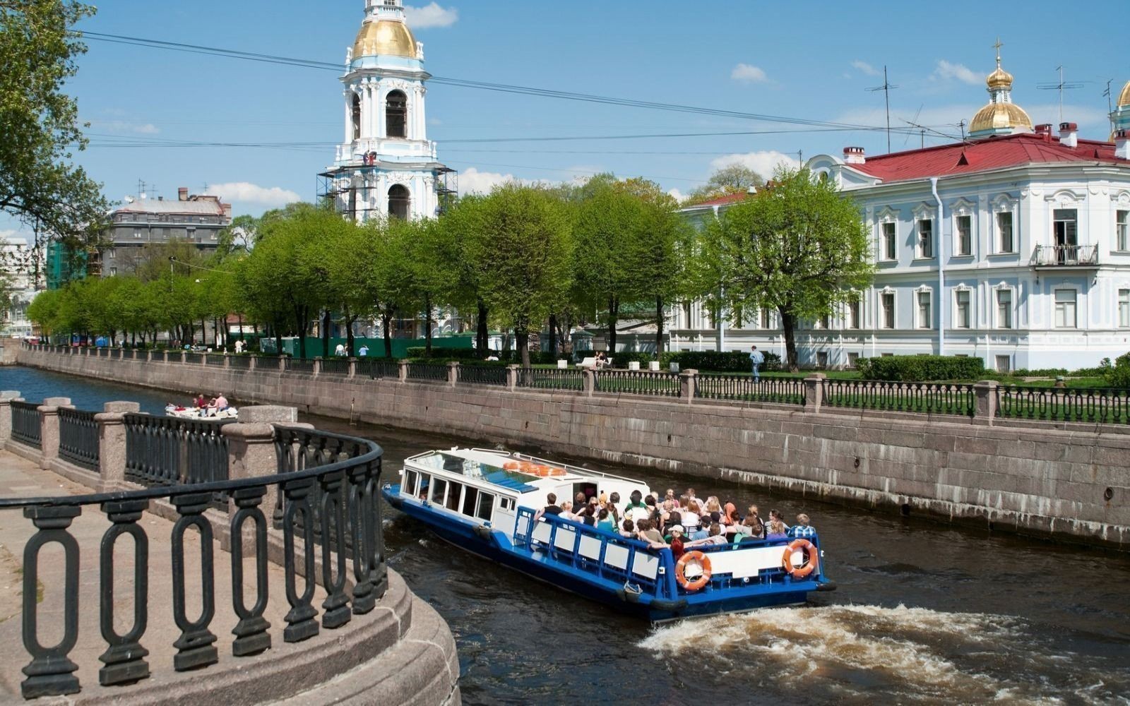 Boat going along the canal of St. Petersburg